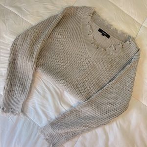 Grey distressed knit sweater